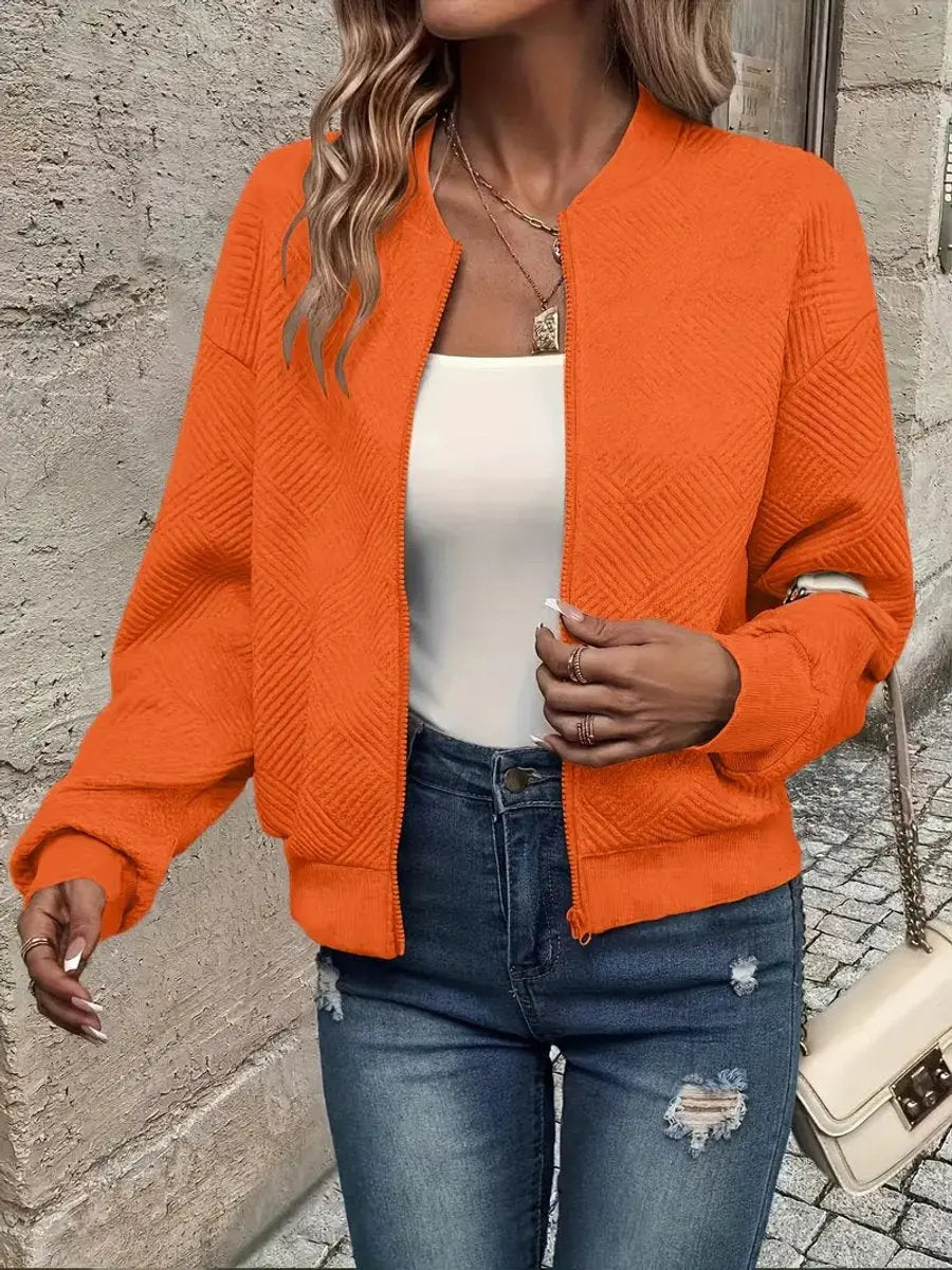 Versatile women's cropped quilted bomber jacket, a zip-up essential for casual and layering outfits.