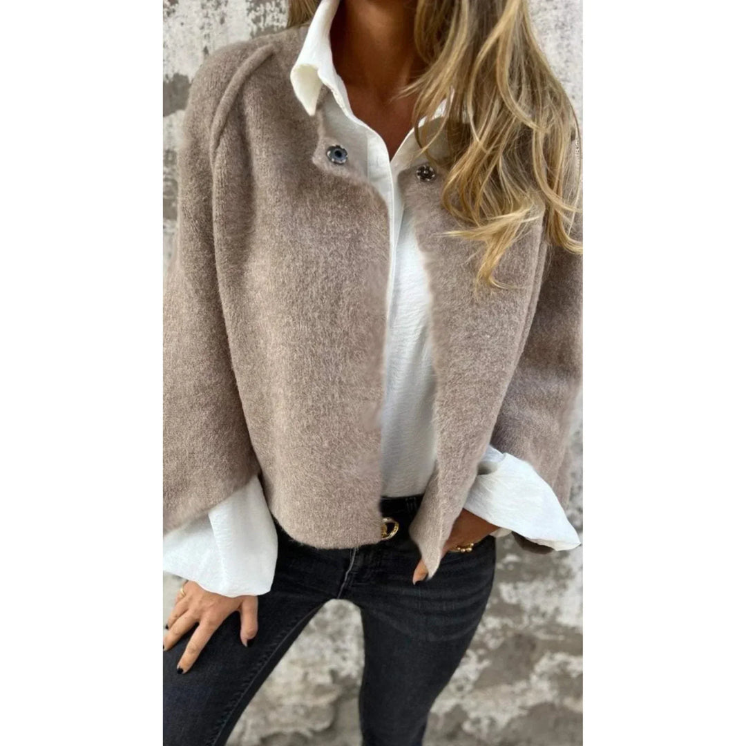 Women's cropped soft knit cardigan with stand collar & wide sleeves. Cozy, elegant layering piece.