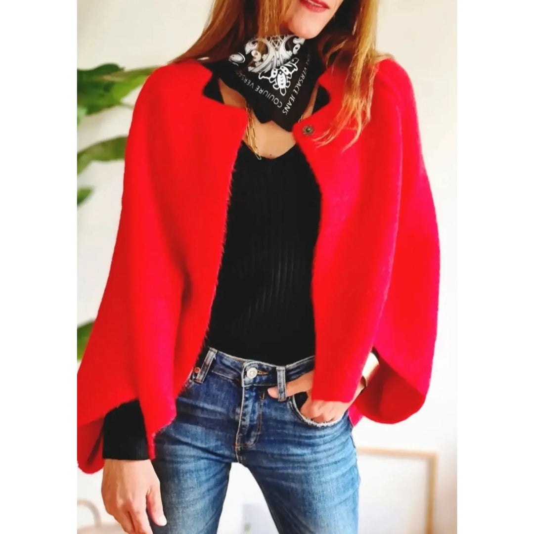 Cozy women's cropped knit cardigan with stand collar. Soft knit for elegant, versatile layering.