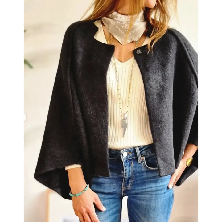 Women's cropped soft knit cardigan with stand collar & wide sleeves. Versatile, cozy knitwear.