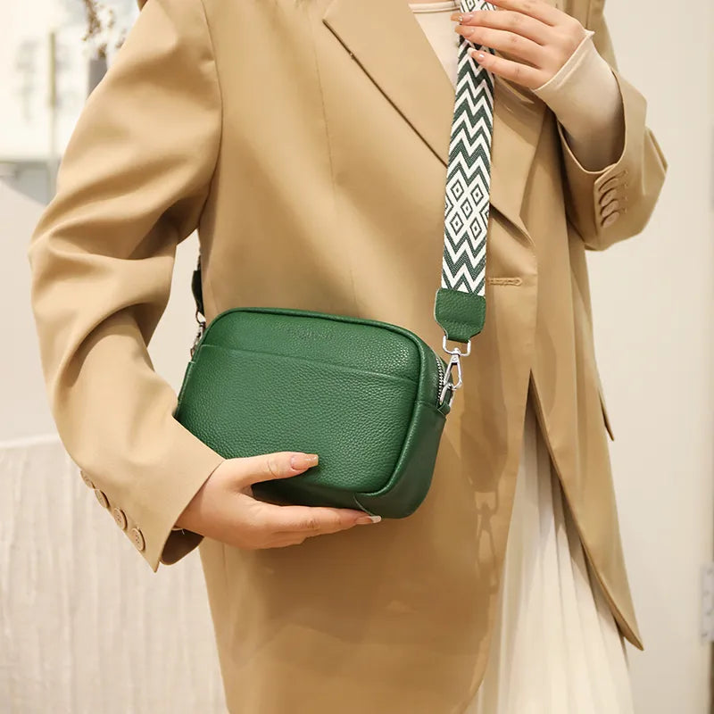 Stylish blue pebbled crossbody bag for women, an adjustable travel shoulder bag and everyday purse.
