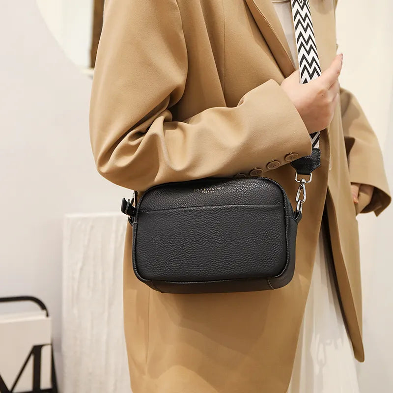 Green pebbled crossbody bag for women, a compact and practical shoulder bag with adjustable strap.