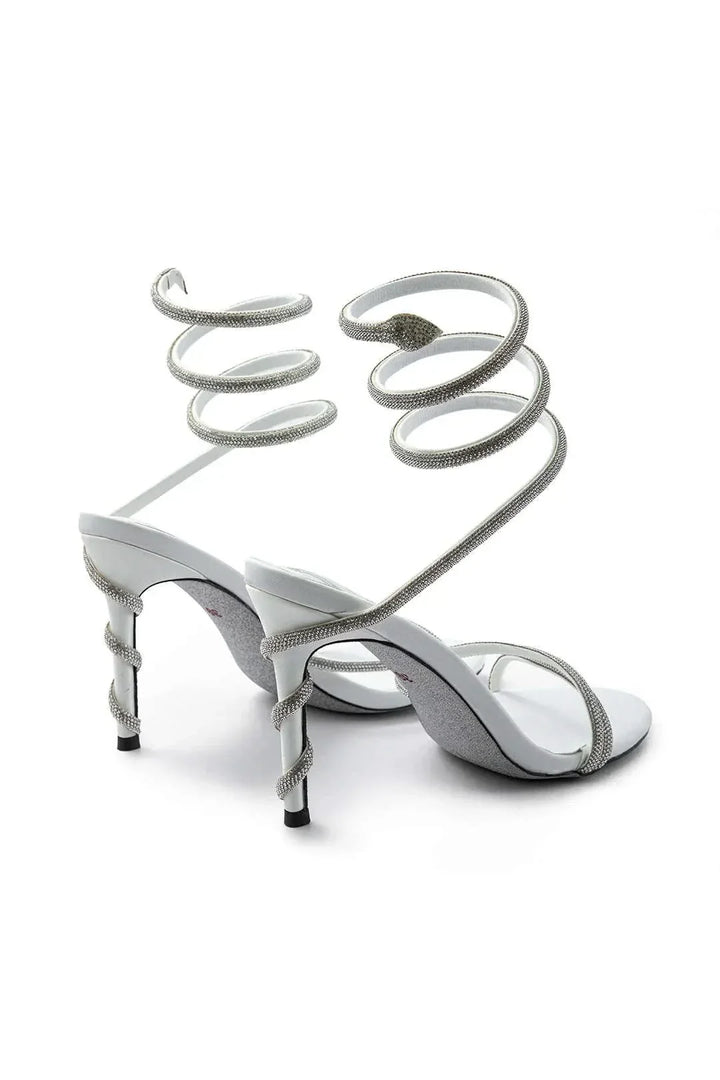 Stylish women's crystal spiral stiletto heels. Luxurious formal footwear for a sophisticated look, great for wedding guests.