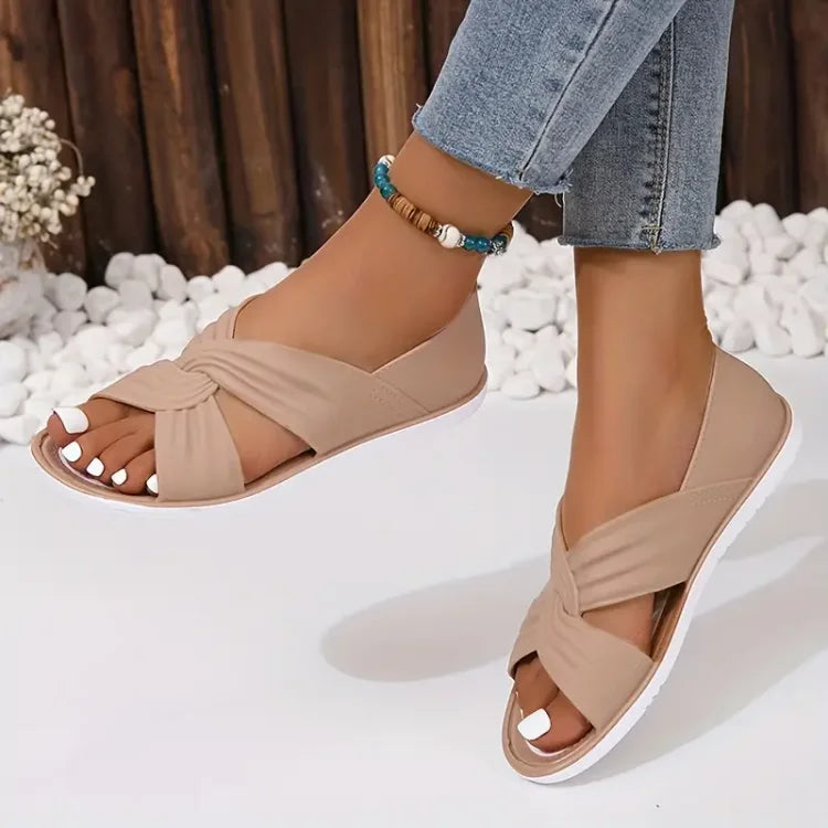 Women's cushioned crossover sandals for all-day comfort. Perfect slip-on summer shoes with arch support.