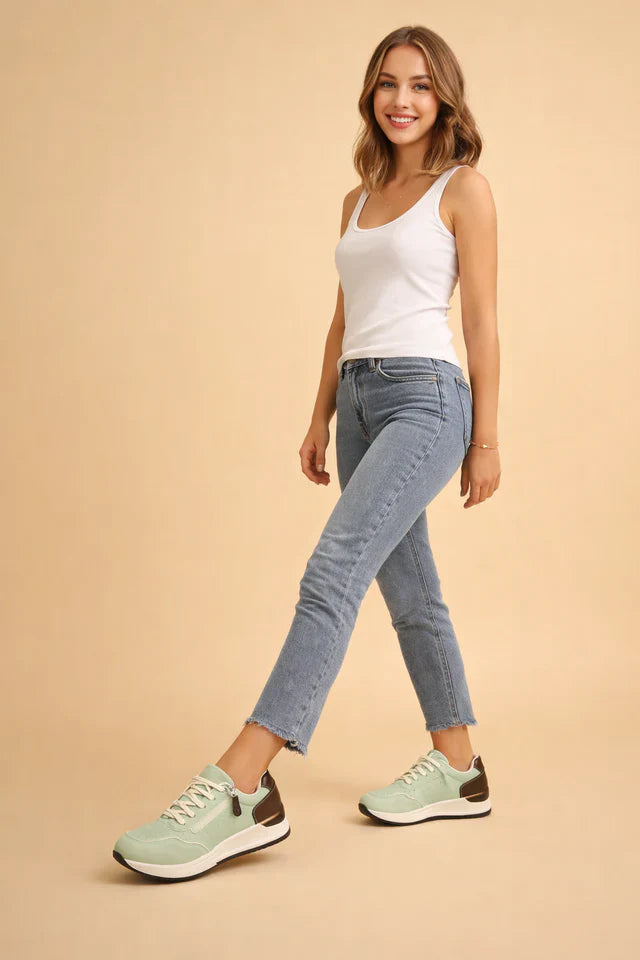 Perforated design women's low-top sneakers, cushioned for all-day comfort, ideal everyday footwear.
