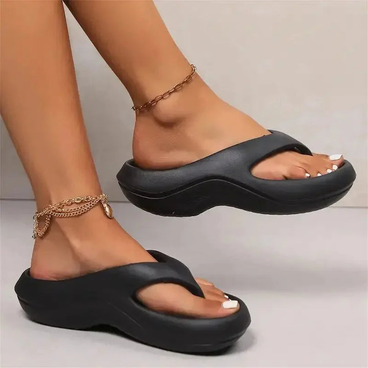 Deeply cushioned women's platform thong sandals, featuring a soft sole for ultimate comfort footwear.