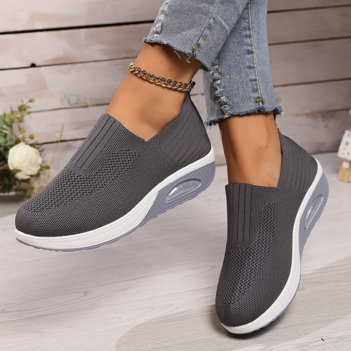 Comfortable women's slip-on footwear, offering excellent foot support and soft cushioning.