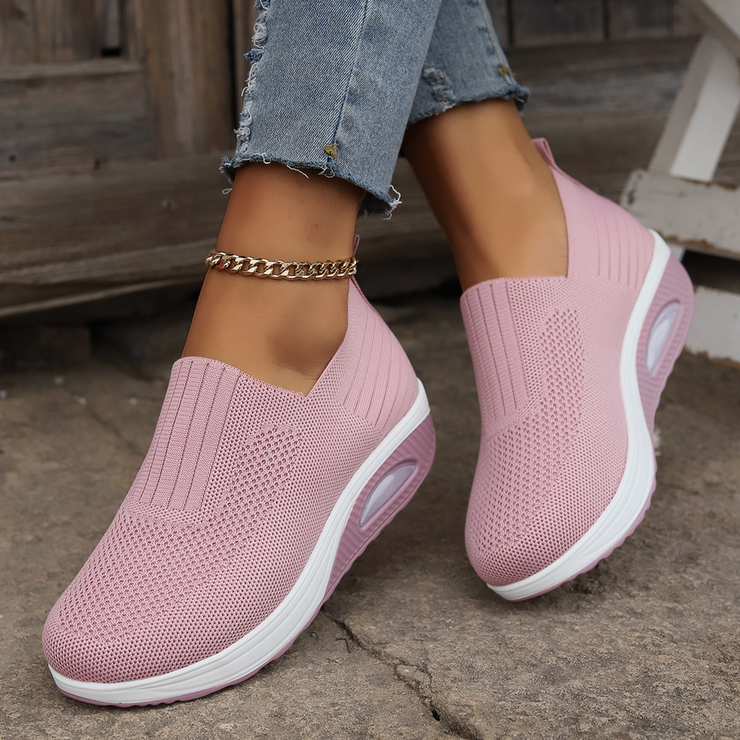Stylish women's slip-on sneakers, lightweight and providing lasting cushioned comfort.