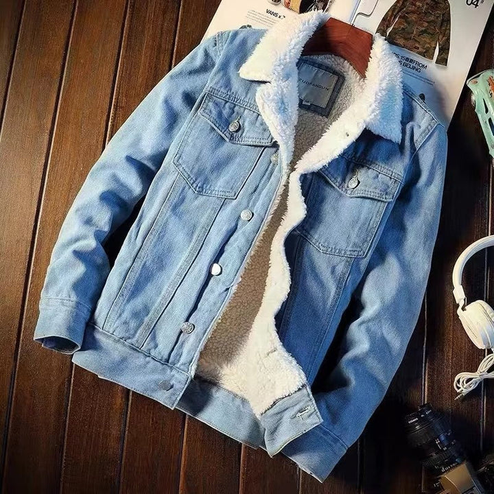 Model wearing a casual style women's fleece lined denim jacket in dark blue.