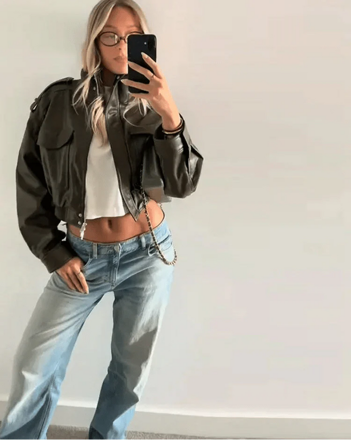 Stylish women's cropped leather bomber jacket, perfect for an edgy, modern, and effortless fashion look.