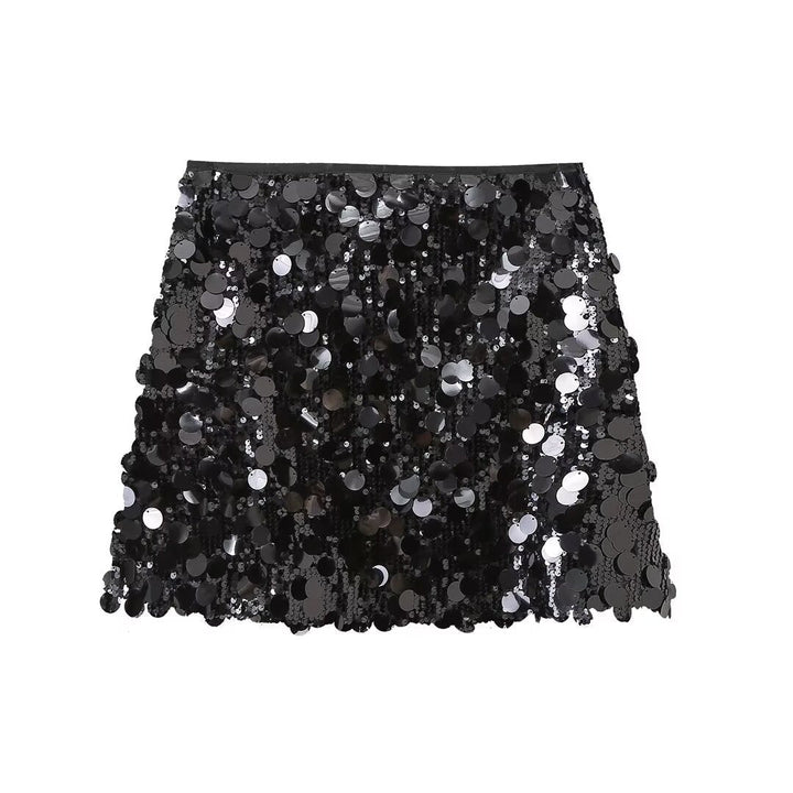 Sparkling women's sequin mini skirt, a glamorous fashion choice for parties and special occasions.