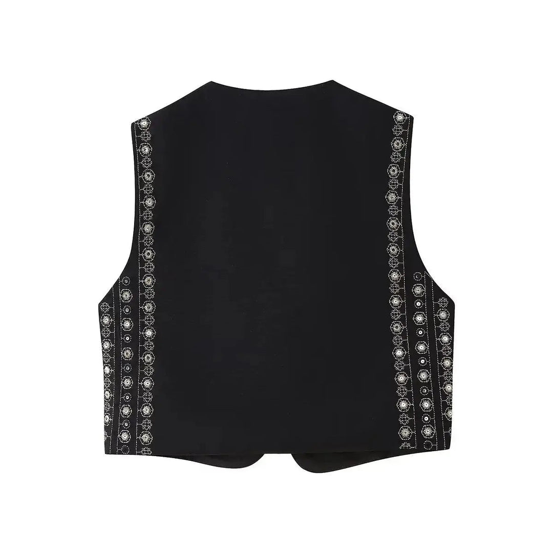 Bohemian sequin vest for women, featuring intricate embroidery. Sleeveless cropped style, ideal for festivals.