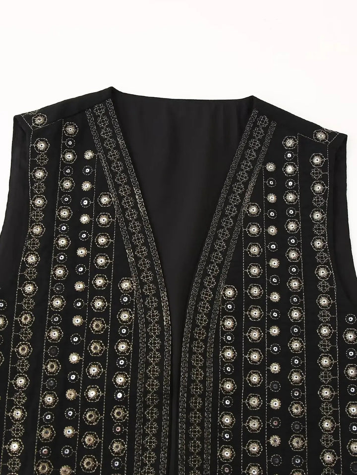 Glamorous women's boho vest with sparkling sequins & intricate embroidery. Sleeveless layering top for chic outfits.