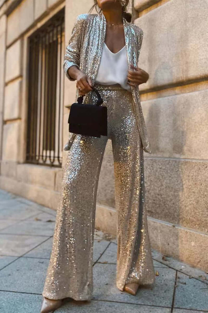 Women's dazzling sequin long sleeve suit set with wide leg pants, perfect for glamorous party & evening wear.
