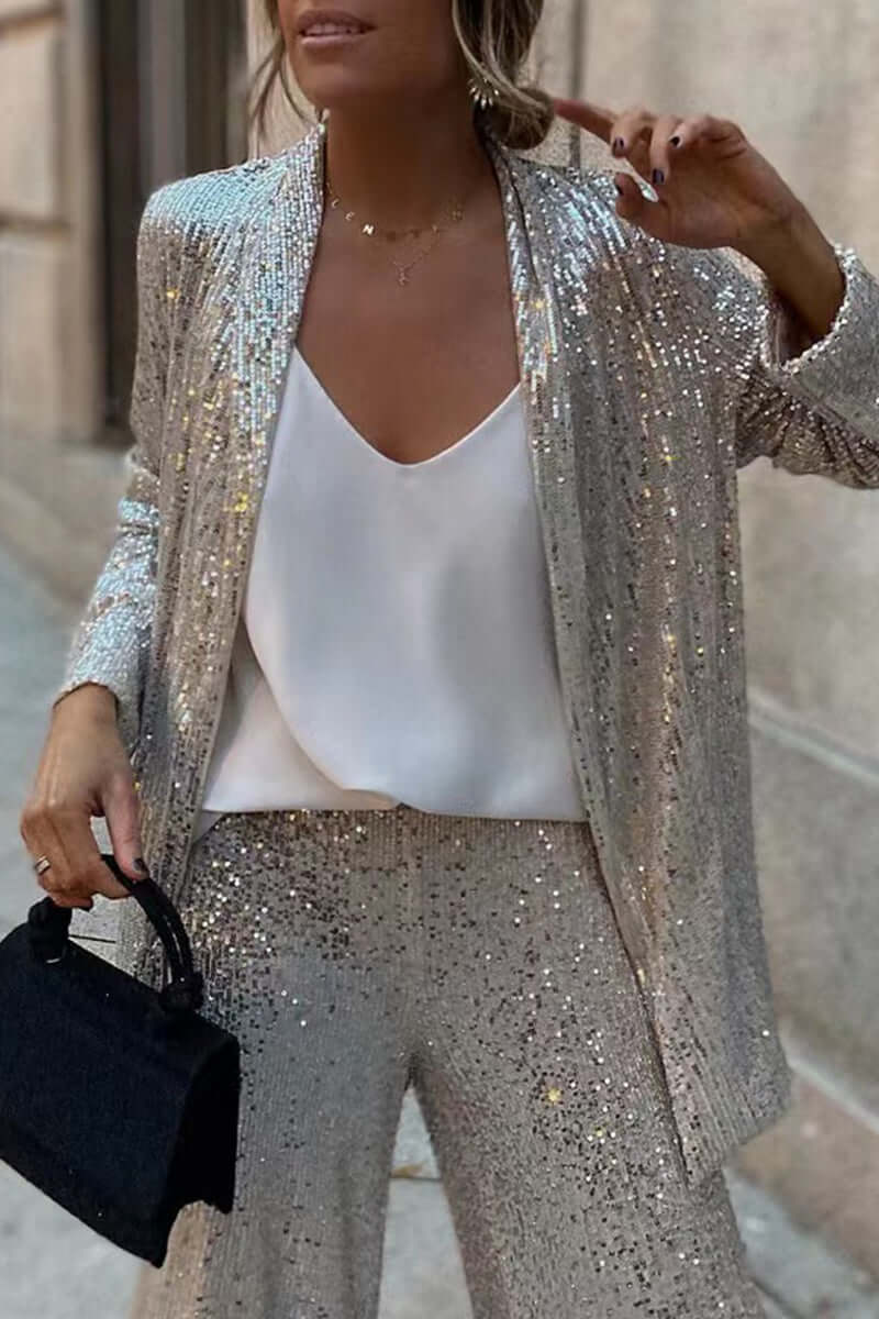 Sparkling women's sequin long sleeve top & wide leg pants set. Ideal glamorous party or evening outfit.