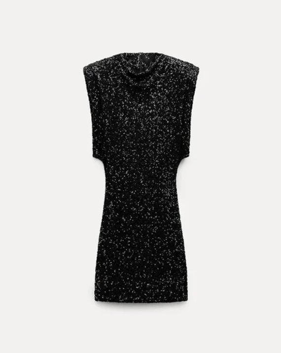 Glamorous sequined mini dress, short & sparkling. Women's evening party wear, ideal for a dazzling special occasion.