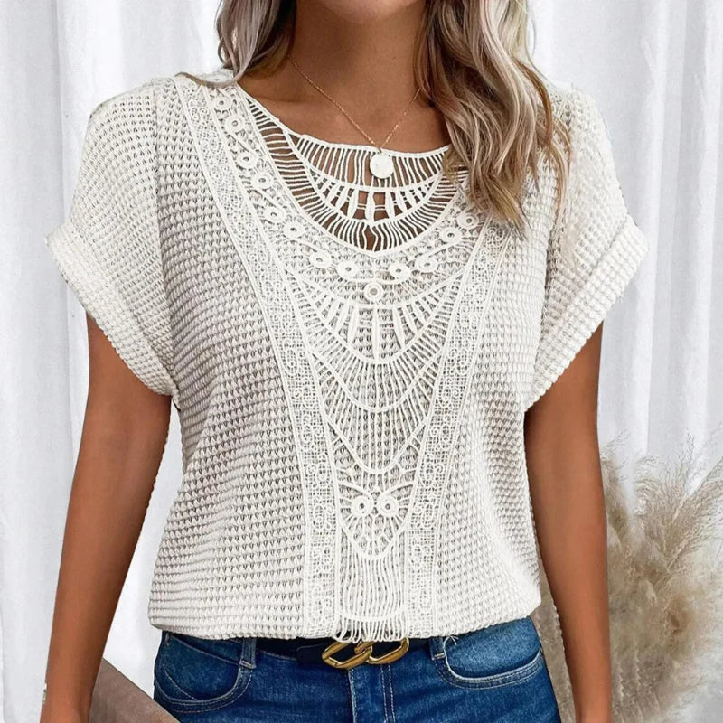 Versatile women's crochet-style short sleeve blouse, perfect for spring and summer casual chic outfits.