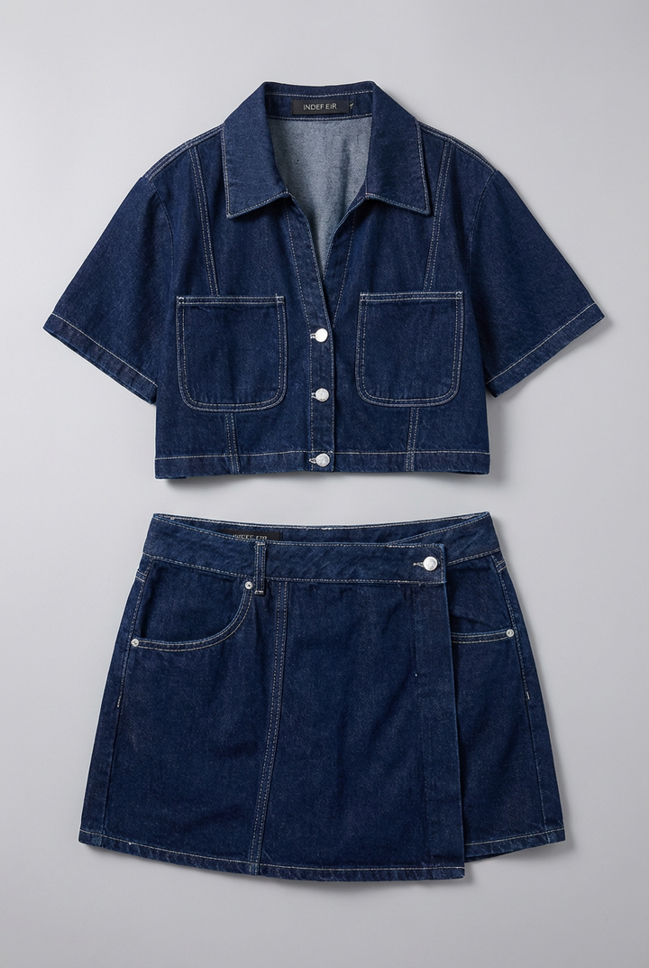 Chic women's denim-style cropped shirt & mini skirt co-ord set featuring trendy contrast stitching. Summer fashion.