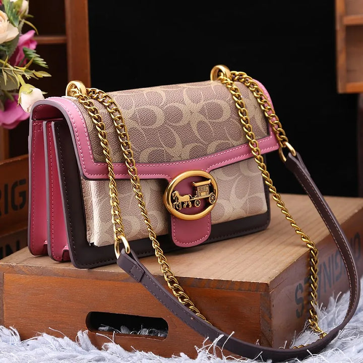 Women's designer crossbody bag featuring a stylish colorblock strap and ample space.