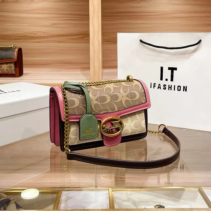 Chic colorblock strap detail on a premium women's designer crossbody handbag.