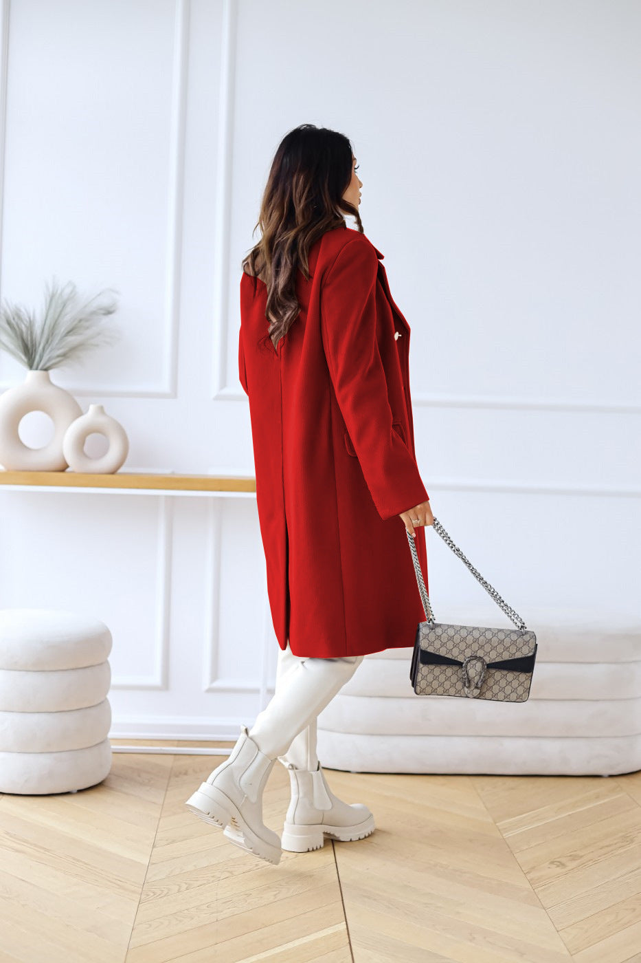 Elegant women's double-breasted long fall coat, sophisticated and versatile outerwear.