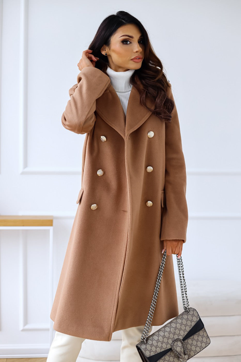 Warm ladies long coat, double-breasted, a chic and classic jacket for cold days.