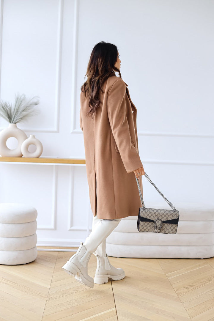 Elegant ladies long coat, double-breasted, a timeless classic for any outfit.