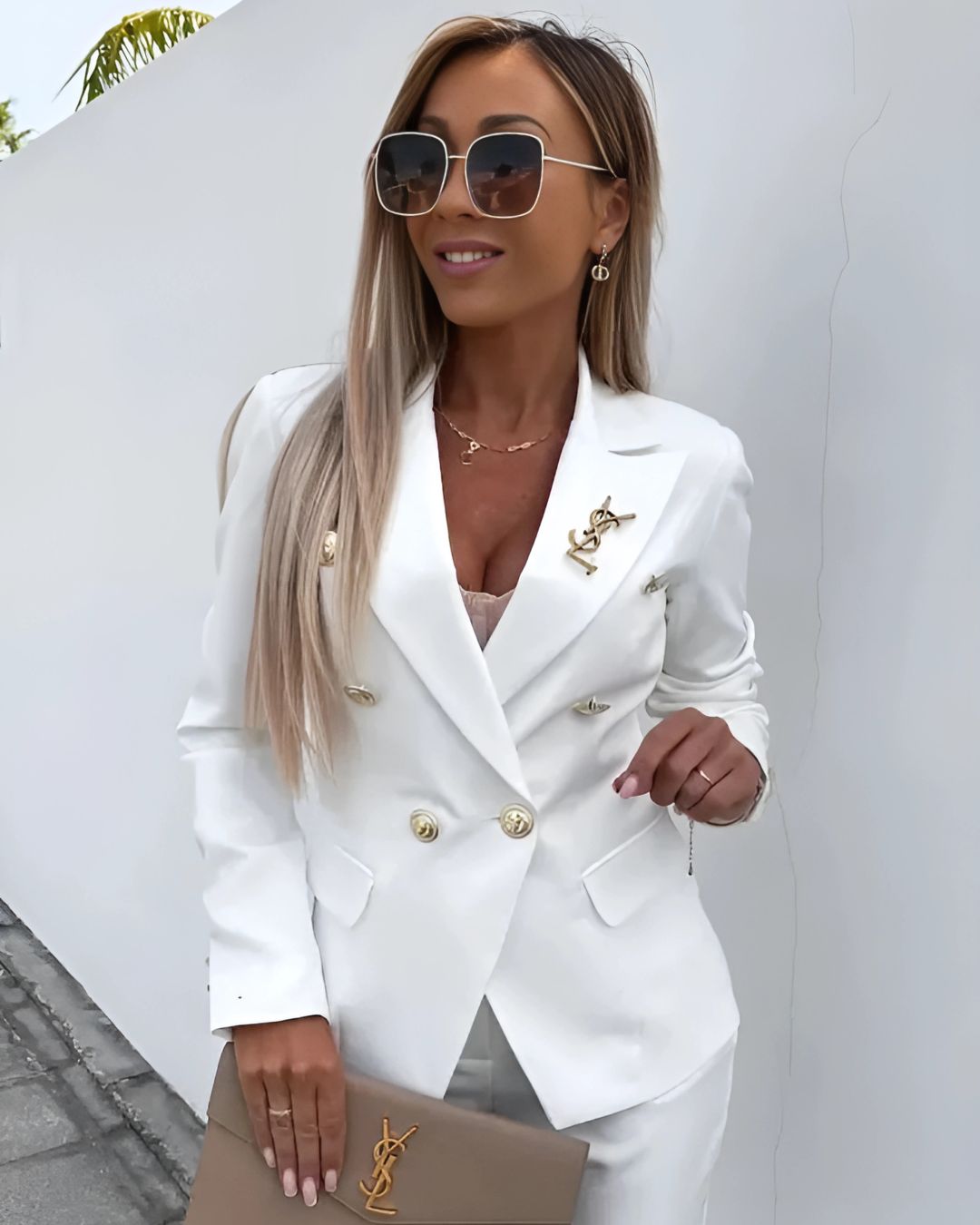 Elegant women's double-breasted suit set, tailored for a sophisticated fit. Perfect formal business attire.