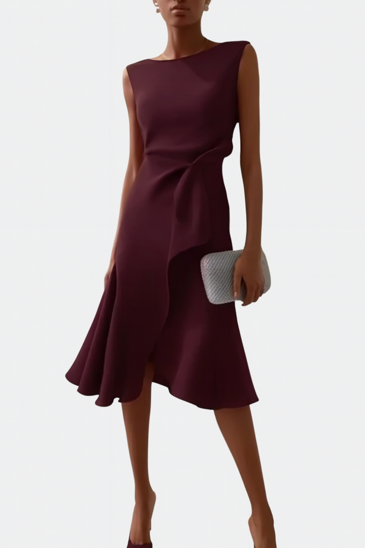 Feminine women's midi dress with draped asymmetric A-line. Elegant sleeveless style for wedding guests.