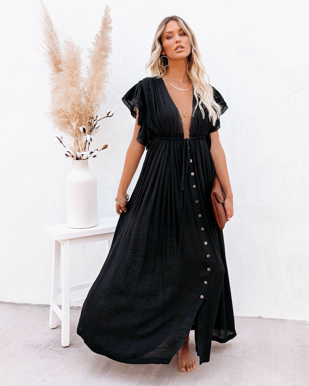 Women's draped bohemian flowy maxi dress, perfect for summer vacation wear.