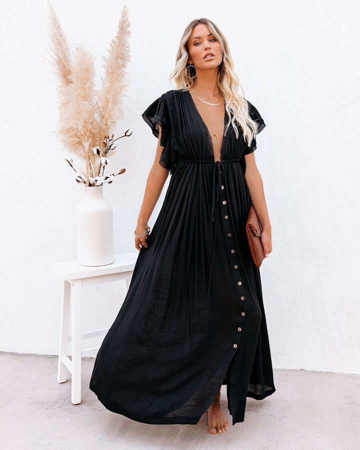 Women's draped bohemian flowy maxi dress, perfect for summer vacation wear.