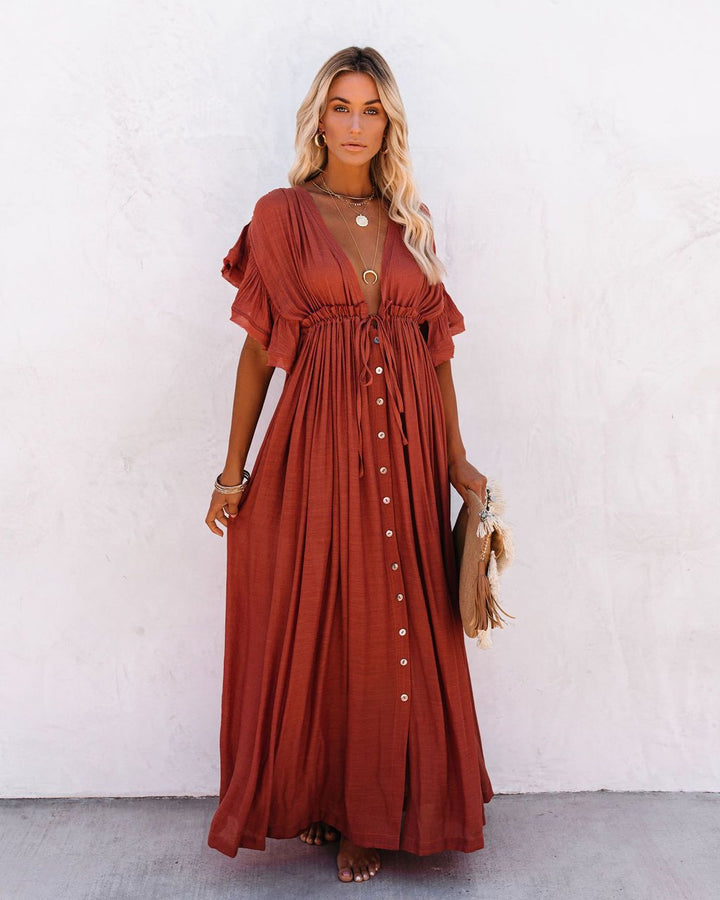 Flowy draped maxi dress for women, embodying a relaxed bohemian summer style.