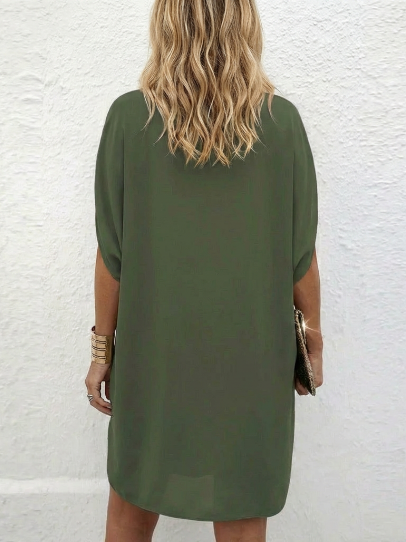Comfortable women's draped V-neck shift dress, featuring a relaxed fit and cap sleeves, versatile for daily wear.