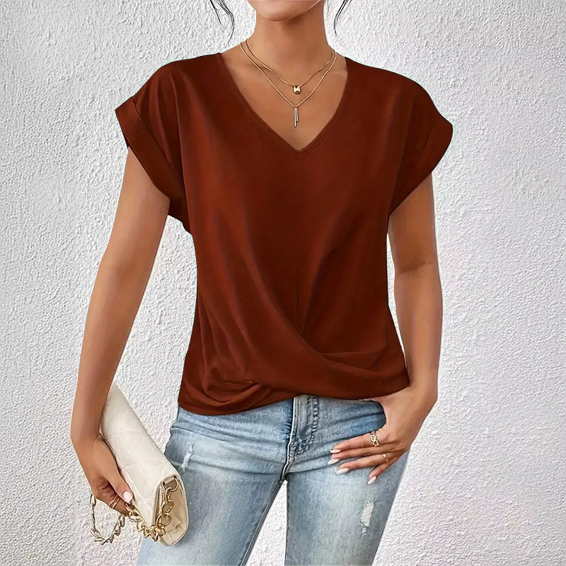 Stylish women's draped V-neck top with short sleeves. Ideal for business casual, spring, or summer fashion.
