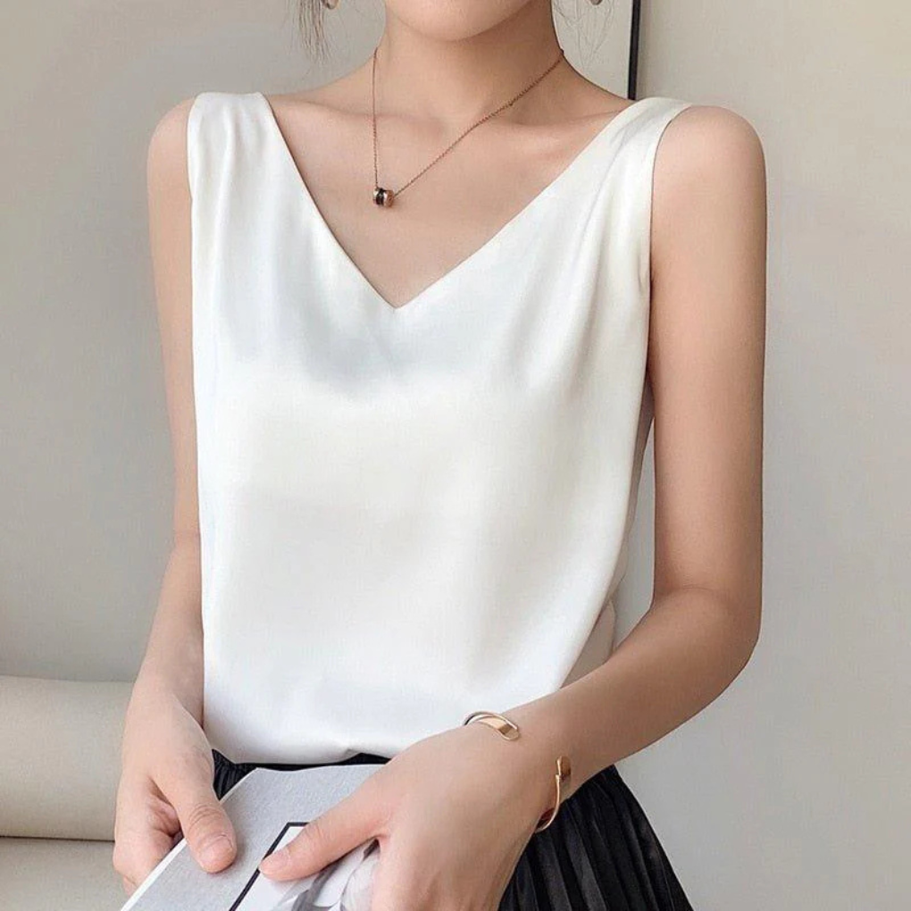 Versatile women's draped V-neck tank top for easy layering or stand-alone chic summer wear. Sleeveless fashion.