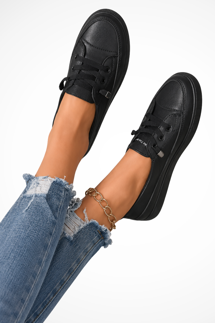 Stylish women's slip-on casual sneakers, perfect for easy wear and spring fashion.