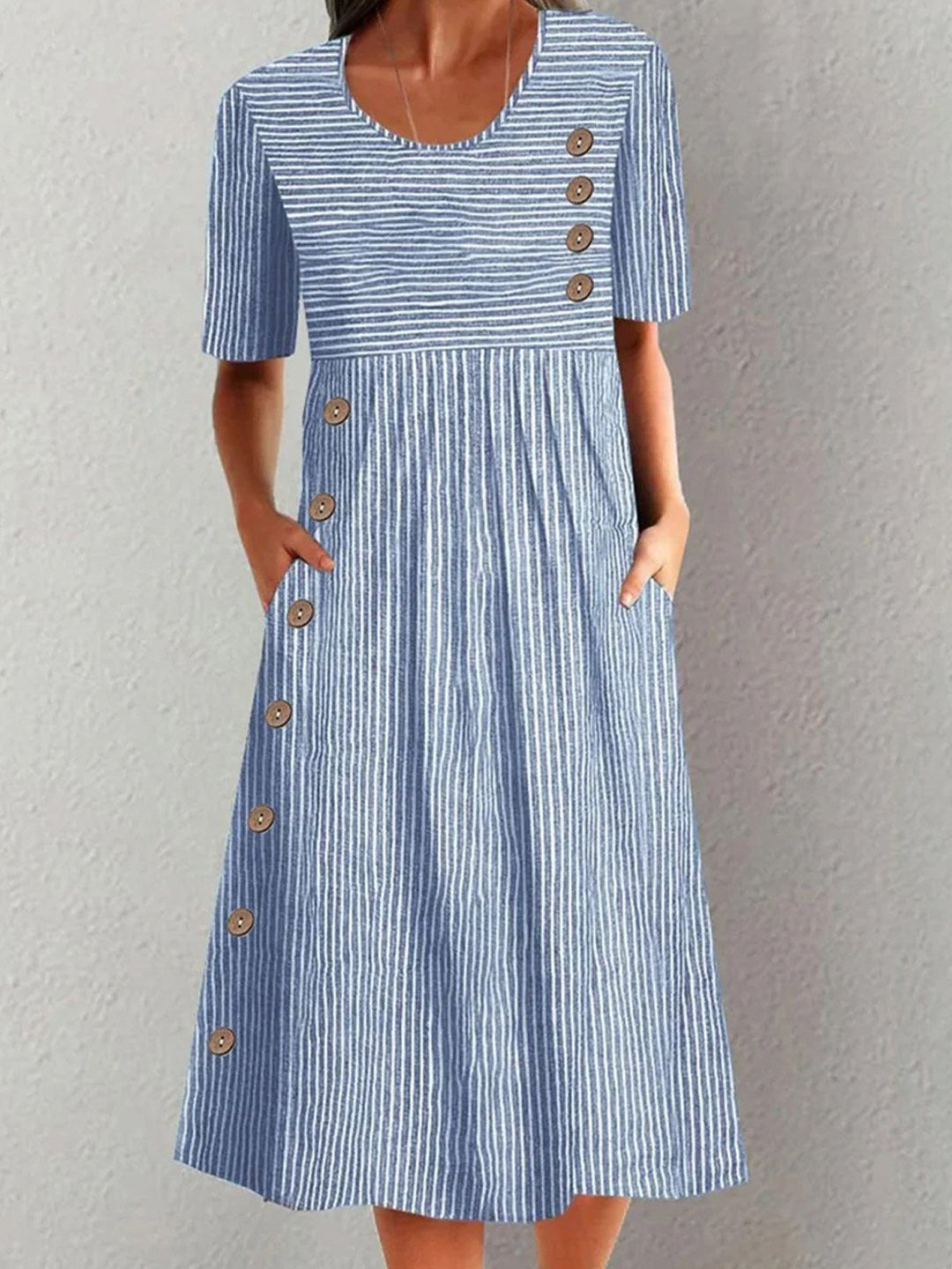 Women's Effortless Blue Striped Midi Dress with short sleeves, crew neck, and comfortable relaxed fit for casual summer wear.