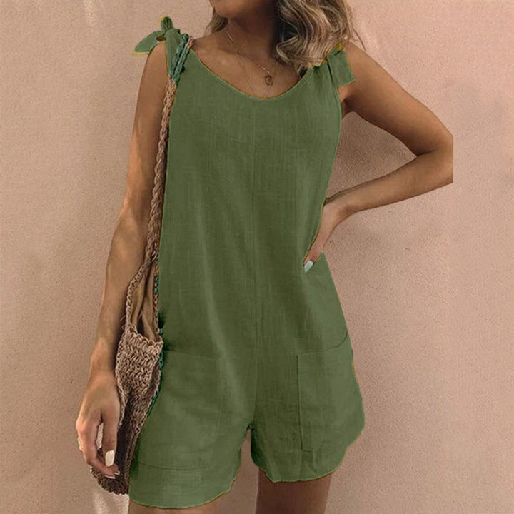 Effortless women's summer playsuit with charming bow straps and handy pockets, perfect for easy casual fashion.