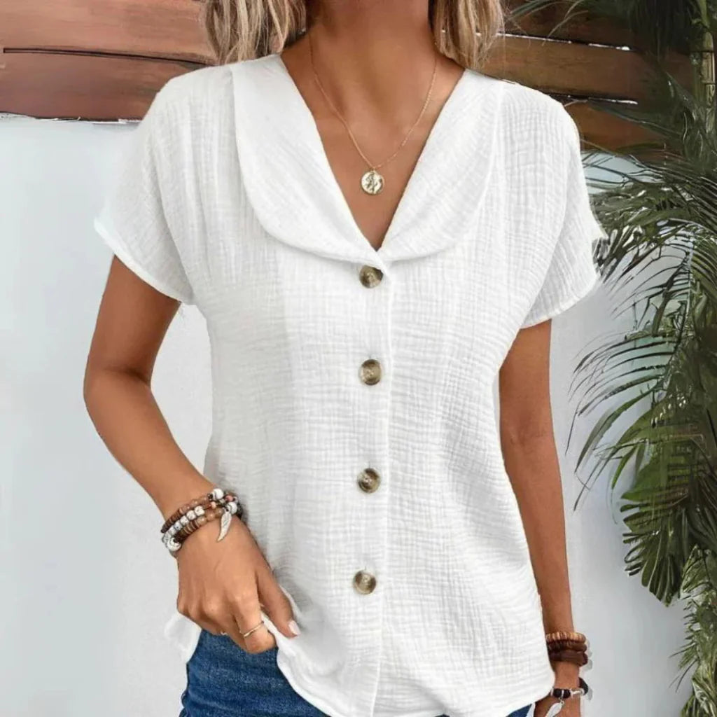 Women's effortless button-down collared blouse, short sleeve, relaxed fit, perfect for summer casual wear.