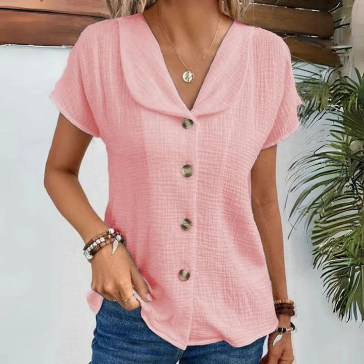 Chic women's short sleeve button-down blouse with collar for versatile everyday style and casual comfort.