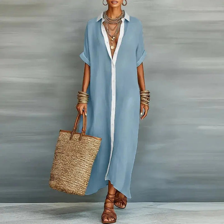 Everyday women's maxi shirt dress featuring a full button-down, short sleeves, and relaxed, flowy silhouette.