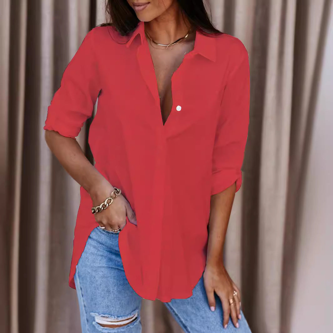 Classic women's button-up shirt with roll-up sleeves. Chic and versatile long sleeve blouse for everyday fashion.