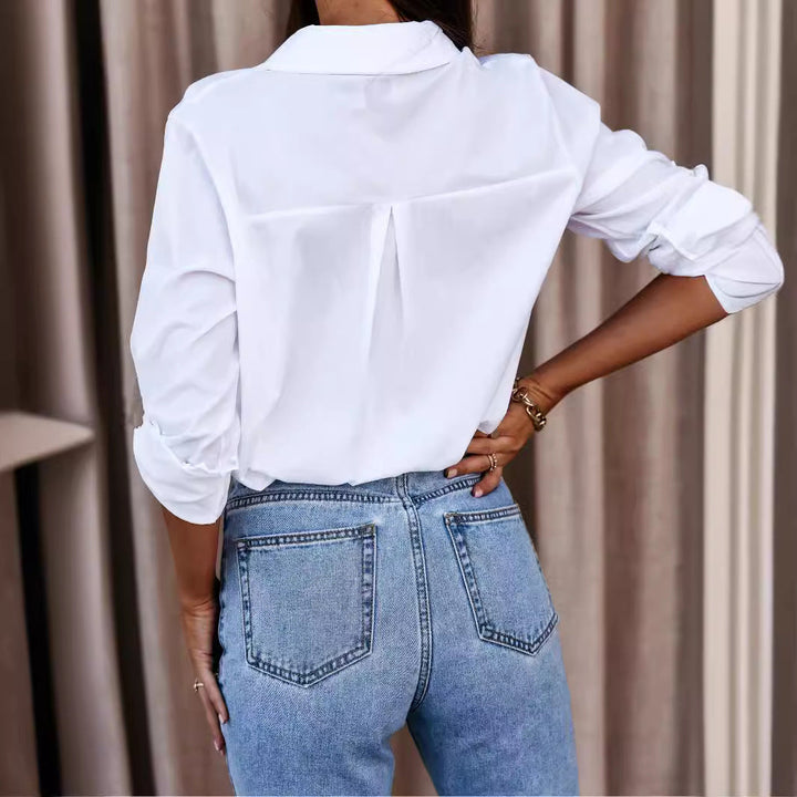 Stylish women's long sleeve button-up shirt, a chic blouse for a relaxed fit everyday or professional look.