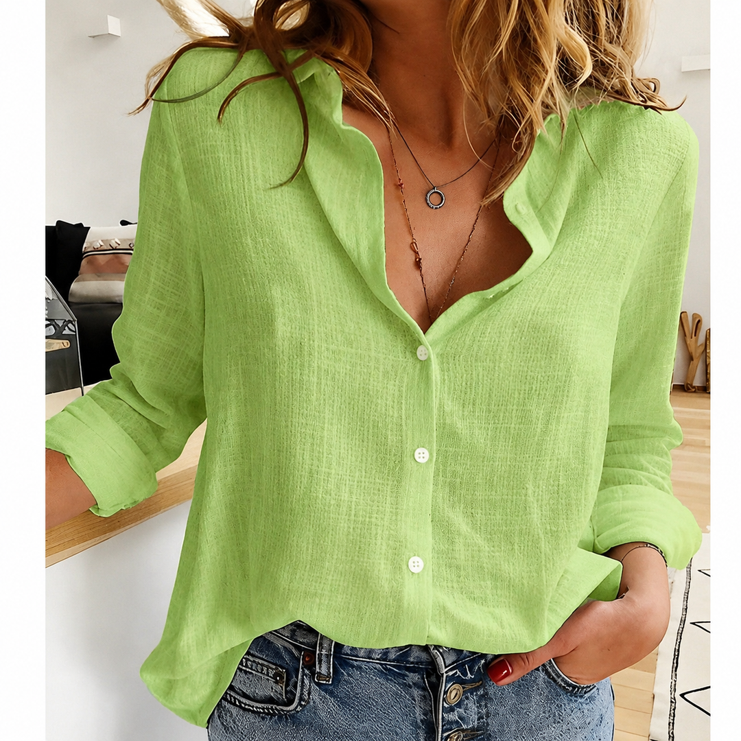 Women's long sleeve button-up blouse, ideal for spring and summer fashion. Casual elegant shirt with versatile wear.