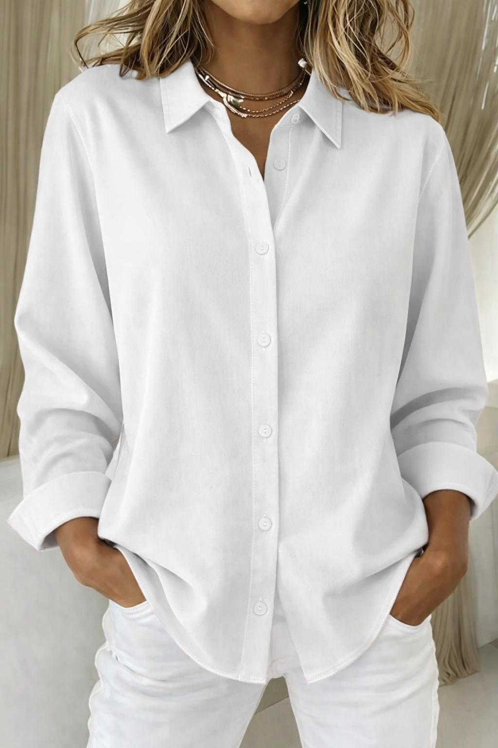 Chic women's loose blouse with point collar & long sleeves, an effortless button-down for everyday style.