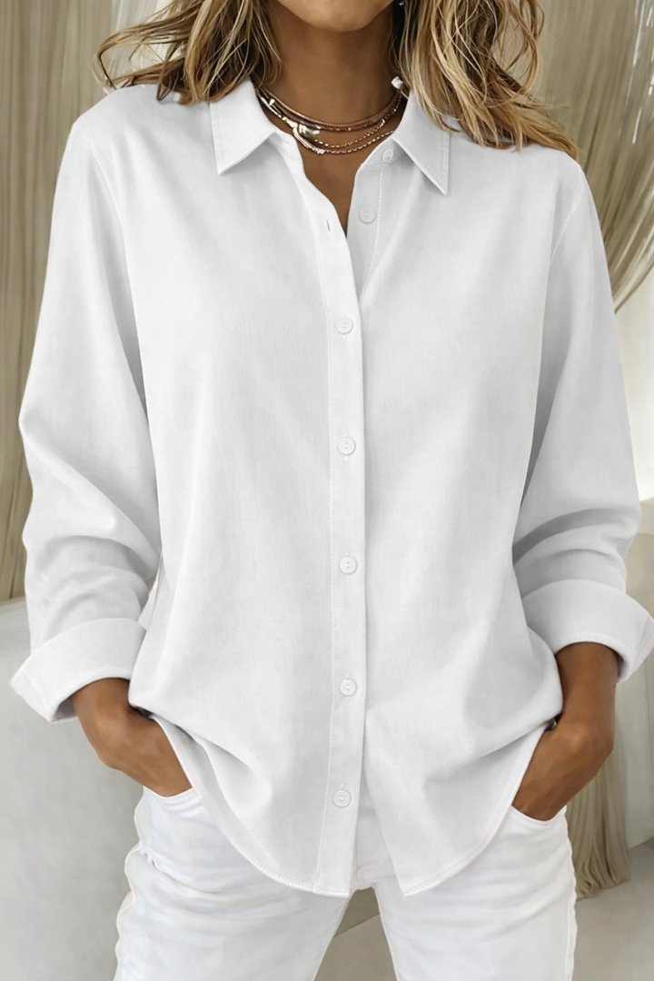 Chic women's loose blouse with point collar & long sleeves, an effortless button-down for everyday style.