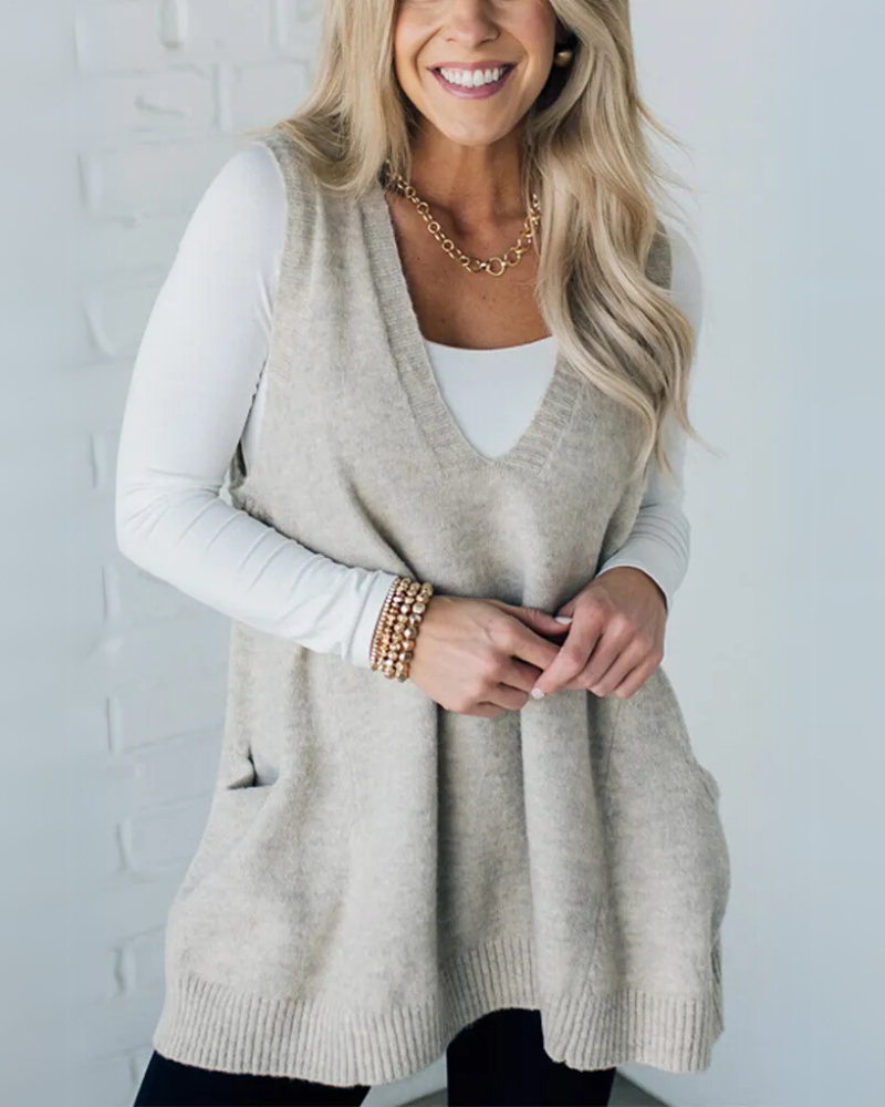 Comfortable women's knit vest in beige, a casual sleeveless layering piece for cozy fall and winter style.