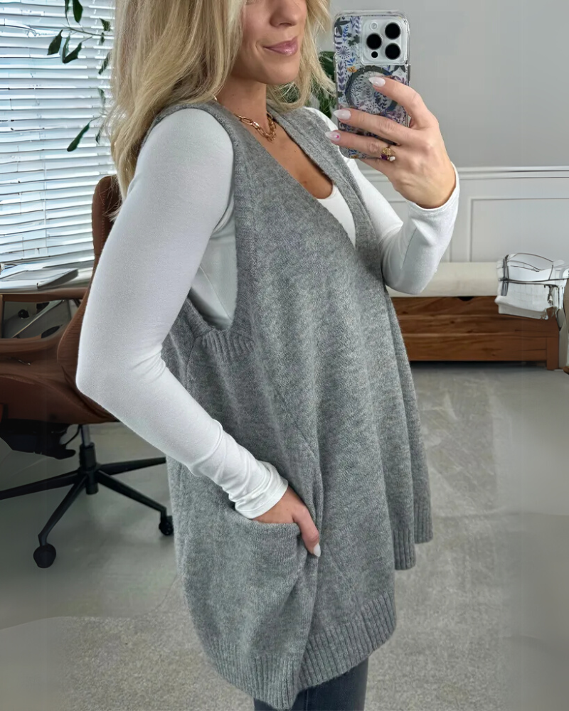 Women's sleeveless knit layering vest, an effortless and cozy piece for casual fall & winter outfits.