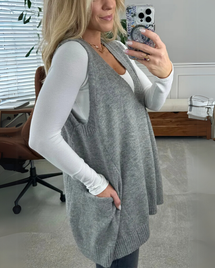 Women's sleeveless knit layering vest, an effortless and cozy piece for casual fall & winter outfits.