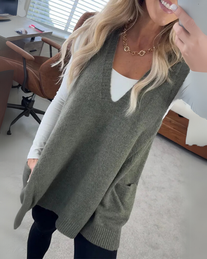 Warm and cozy women's knit vest, an effortless layering piece perfect for stylish fall and winter wear.